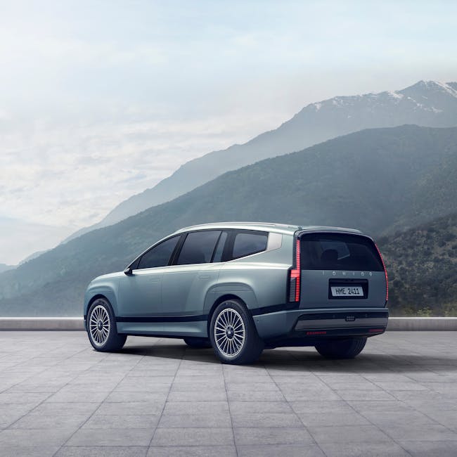 Luxury SUV in mountains representing premium adventure lifestyle